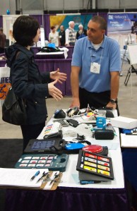Picture of Mike demonstrating various AT tools