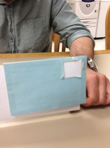 Fixture to allow consumer to position postage stamp in correct location on any envelope.