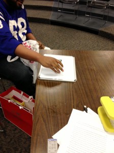 Magnets attached to dry erase board to secure papers while writing. 