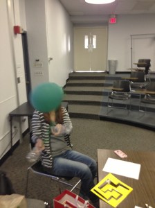 Therapy game for gross motor control made from a balloon tied between two water bottles. Very quiet game!